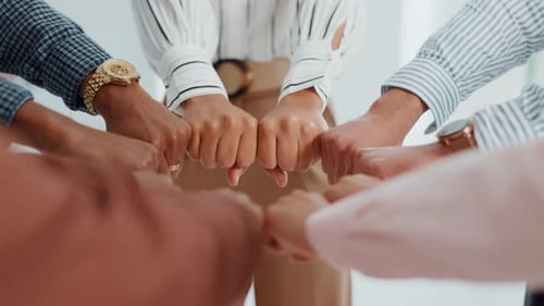 Business, circle or hands of people with fist bump for team building, collaboration and solidarity