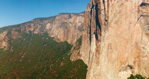 Brown cliff rocks on clear sunny daytime. Stunning mountains of Yosemite National Park, California