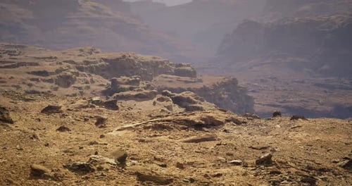 Exploring a Rugged Landscape with Dramatic Rock Formations at Dusk
