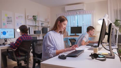Group of businessman and woman using laptop computer working in office.