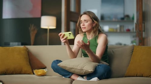 Nervous Lady Using Phone Sitting Couch Emotional Girl Throwing Cellphone Sofa