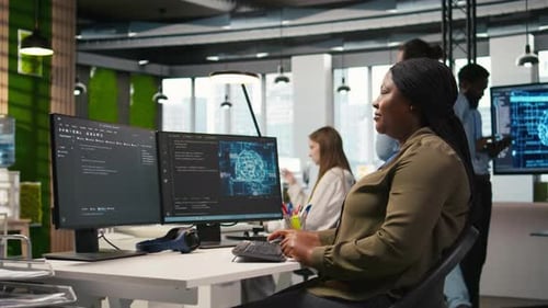 Female Technician Writing Code on PC Developing Neural Networks APIs