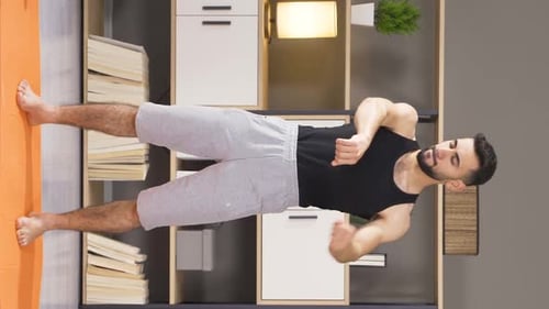 Man Stretching Arms on Yoga Mat Indoors