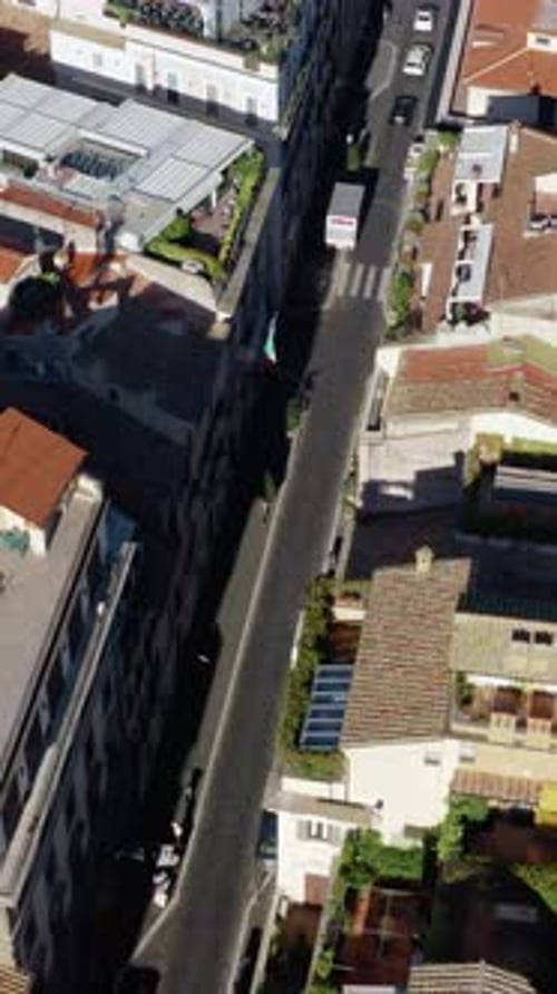 Vertical Drone Aerial View of Narrow Street and Historic Rooftops in Rome Old Town, Scenic Urban