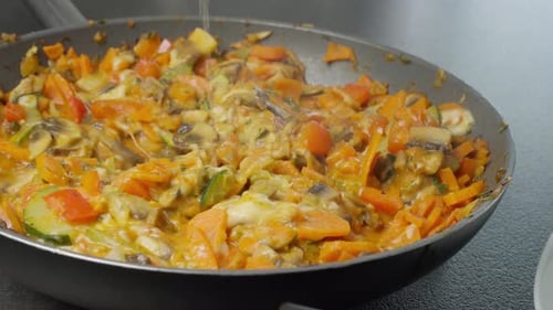 Vegetables Stir Fried in Pan Close Up