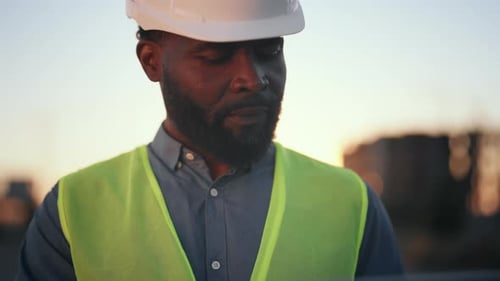 Innovative Development Technology Medium Portrait of Black Foreman with Laptop Engineer on