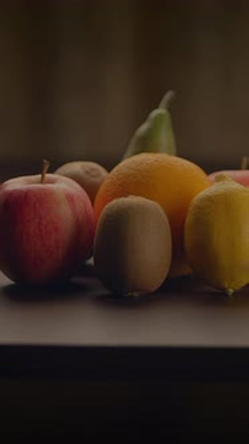 Various Fruits on Table in Indoor Setting