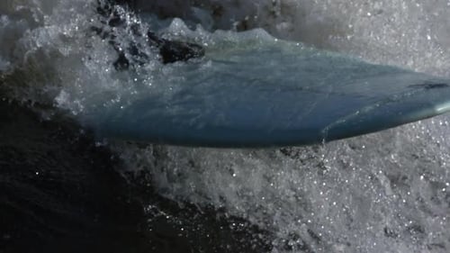 Surfboard Rides Dynamic Foamy White Water
