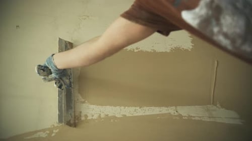 Craftsman Applying Plaster to a Wall