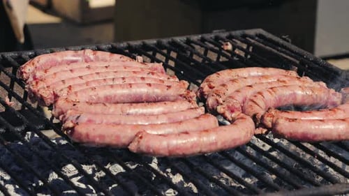 Juicy Beef Sausages Grilled on the Grill Summer Picnic Concept
