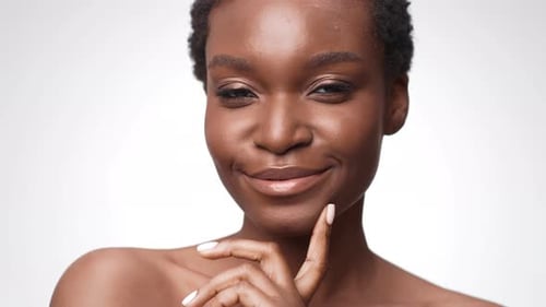 Smiling Woman with Braces Posing in Studio