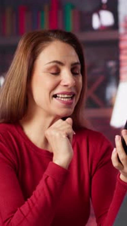 Vertical Video Mature Woman Engaging in Virtual Workshop to Learn New Skills for Job
