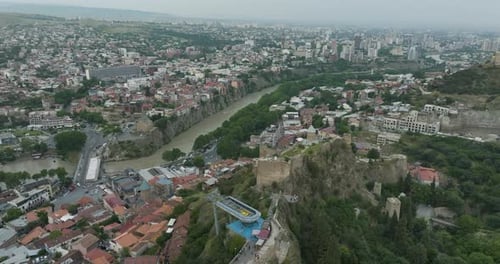 Narikala fortress, Kura river and the Old Tbilisi district during cloudy day.