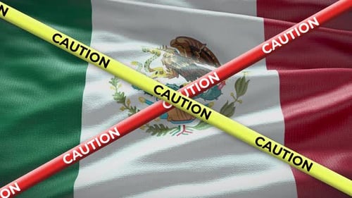Mexico Flag Waving with Caution Barricade Tape
