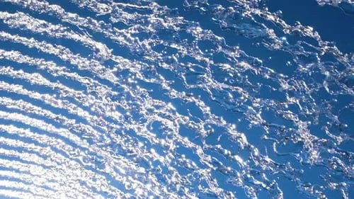 Abstract Water Streams Against Blue Sky