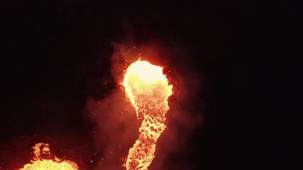 Cover for Boiling Lava Flowing From Crater Of Erupting Volcano In The Dark. Geldingadalir Volcano Eruption In