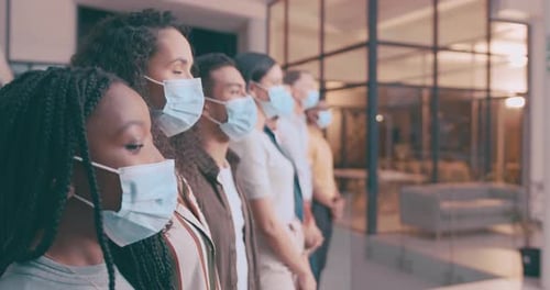 Face mask, queue and row of business people by building for protection, hygiene and pandemic safety