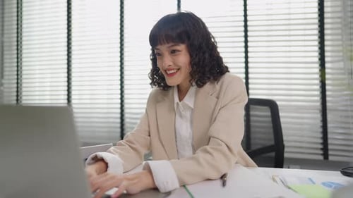 Asian young beautiful businesswoman working in the office workplace.