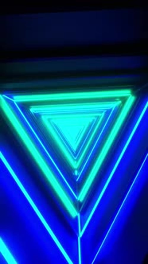 Vertical Loop VJ animation background. Camera flying in a triangular neon tunnel with blue and turqu