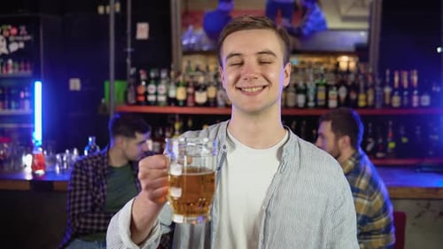 Portrait of a Man with Beer in a Pub