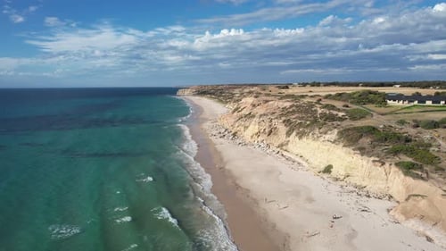 Aerial view of cliffs and sandy shore, Australia.