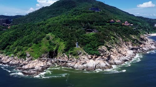 Aerial Top view of a transparent blue sea with beautiful waves at sunny day in summer. air of ocean