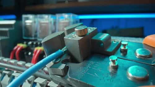 Blue Wire in Wire Stripper Close Up