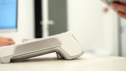 Phone Payment at Card Reader Close Up