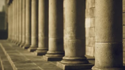 Architectural Elegance Captured in a Row of Weathered Stone Columns