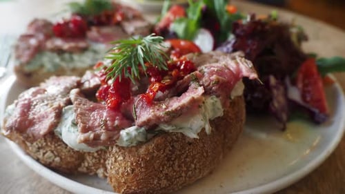 Close up of Delicious Open Faced Sandwiches with Salad