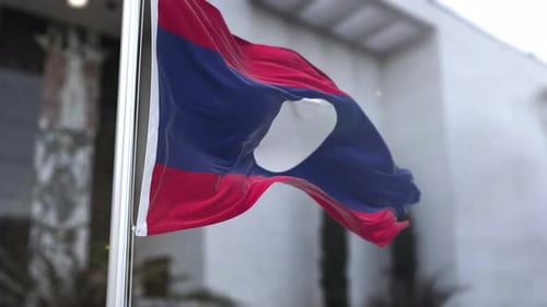 Laos National Flag Waving in Wind