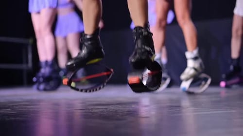 Close-up of Women Jumping with Rebound Boots. Sports, Fitness, Jumpers, Exercises