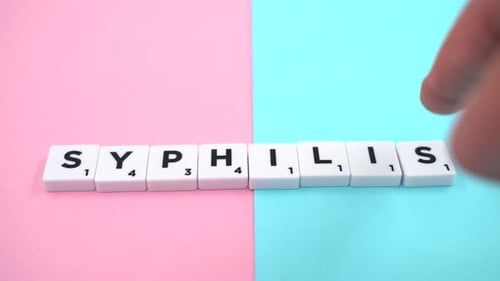 Scrabble Tiles Spell the Word Syphilis