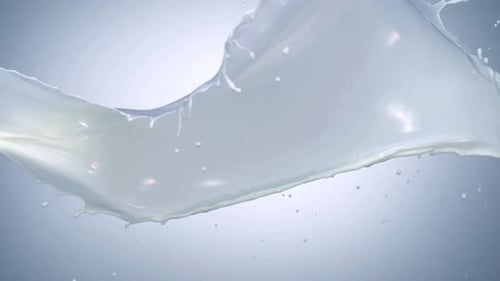Splashing White Liquid in Slow Motion Macro Shot