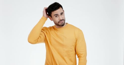 Face, confused and man in studio scratching head with question or unsure on white background