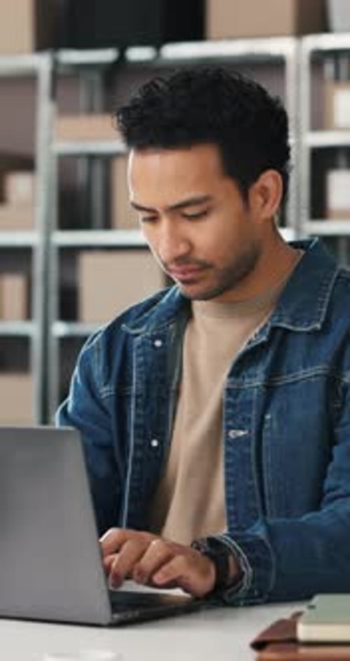 Businessman, typing and boxes with laptop in logistics for supply chain, online order or schedule