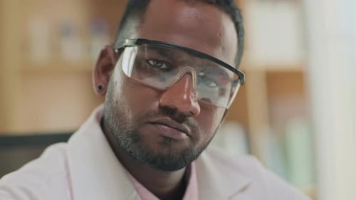 Close Up of Scientist in Lab Coat