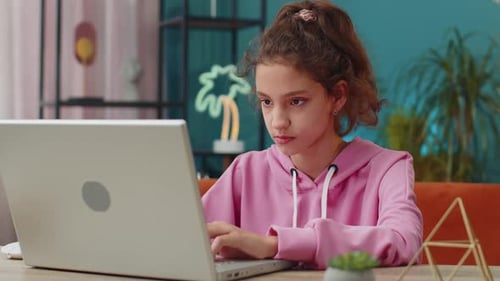 Preteen School Girl Using Laptop for Online Lesson Doing Homework Distance Learning Education