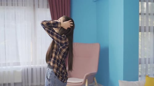 Couple Arguing in Bright Home Interior