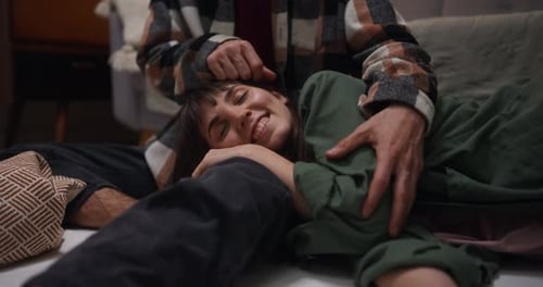 Romantic Couple Relaxing Together Indoors