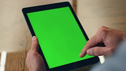Boss Finger Swiping Greenscreen Tablet at Office. Closeup Anonymous Man Surfing Web