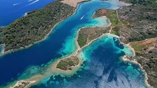 Aerial View of an Island on Sithonia Peninsula Greece with Beaches and Rocks Surrounded By