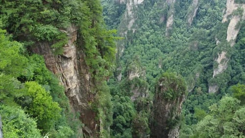 Spectacular Aerial Views Looking Over The Vertical Pinnacles Of The Avatar Mountains in China; Zhang