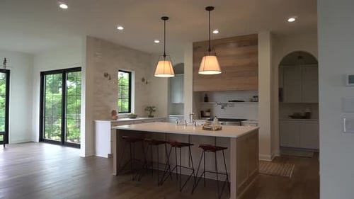 Mid century modern kitchen with island and white pine accents.