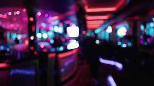 Experience the Vibrant Nightlife Scene Filled with Colorful Neon Lights That Illuminate the