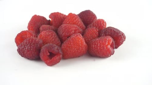 Fresh Raspberries on a White Background