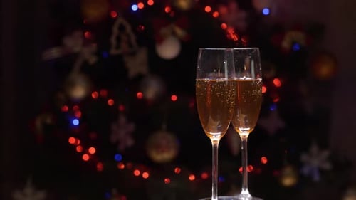 Champagne and Sparklers by Festive Christmas Tree