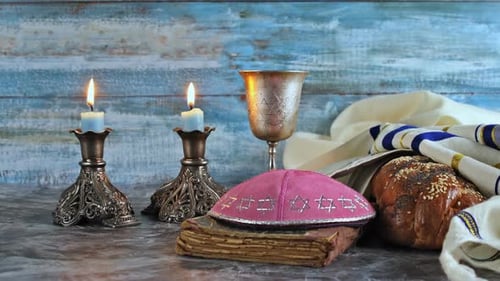 A Traditional Jewish Symbol of Shabbat Shalom on Saturday Religious Holiday with Challah Bread Wine