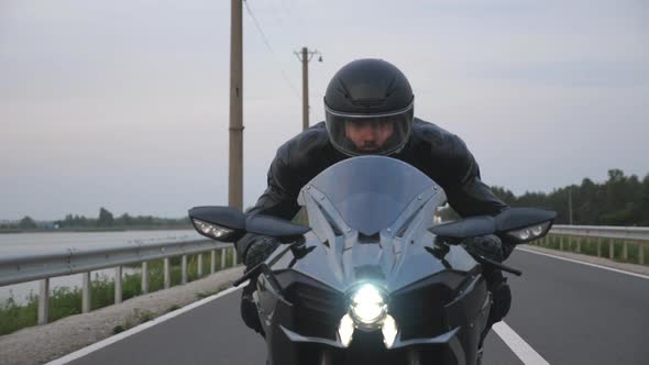 Front View to Biker Riding on Modern Sport Motorbike at Countryside Way ...