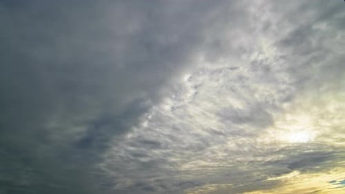 Dramatic Cloudy Sky Timelapse with Sunlight Breaking Through